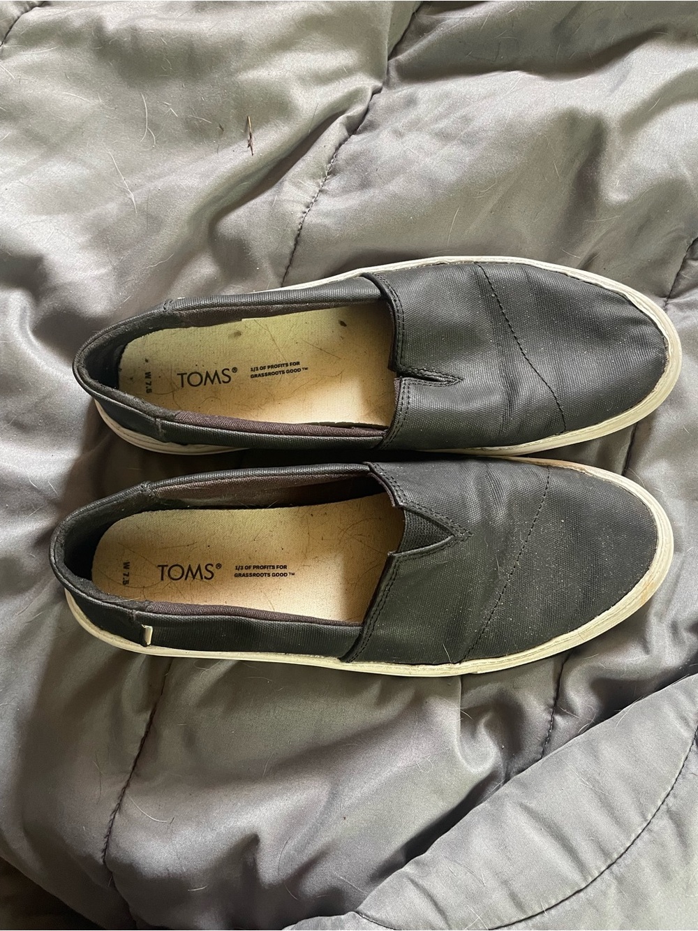 Toms Woman’s Black Canvas Slip-On Loafers